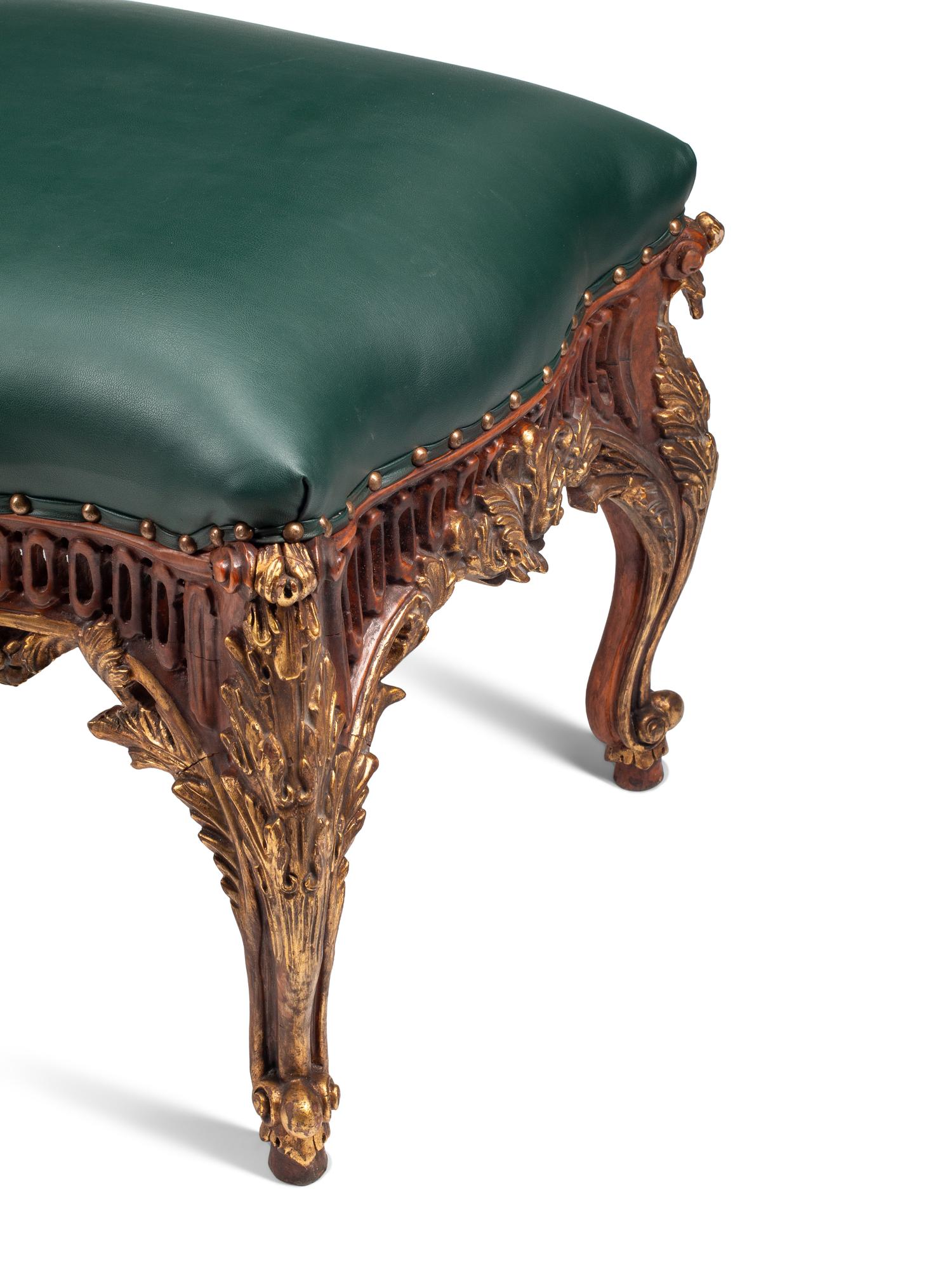 A Pair of Régence Style Painted and Parcel Gilt Stools
