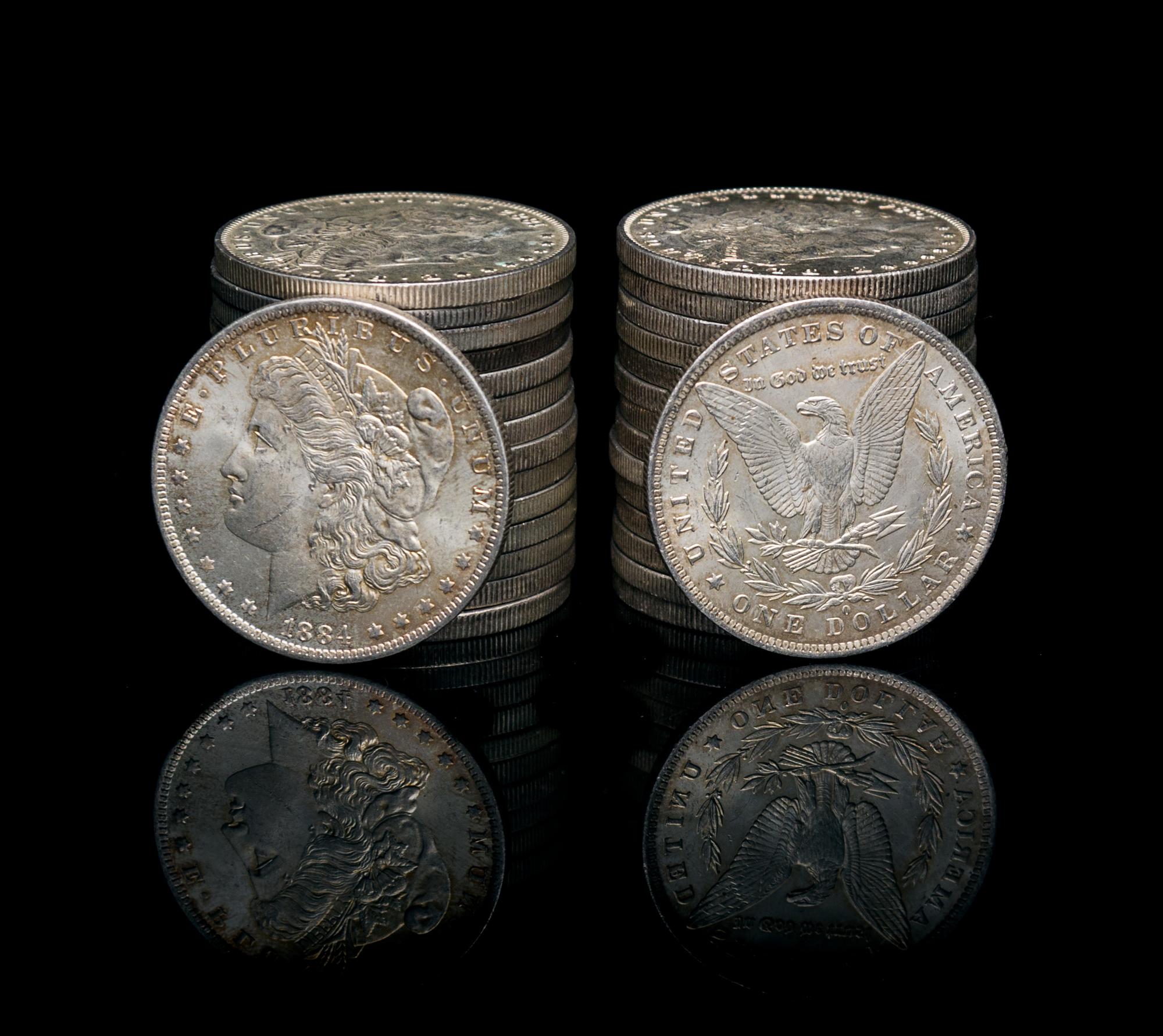 A Group of Thirty-Two United States Morgan Silver Dollar Coins