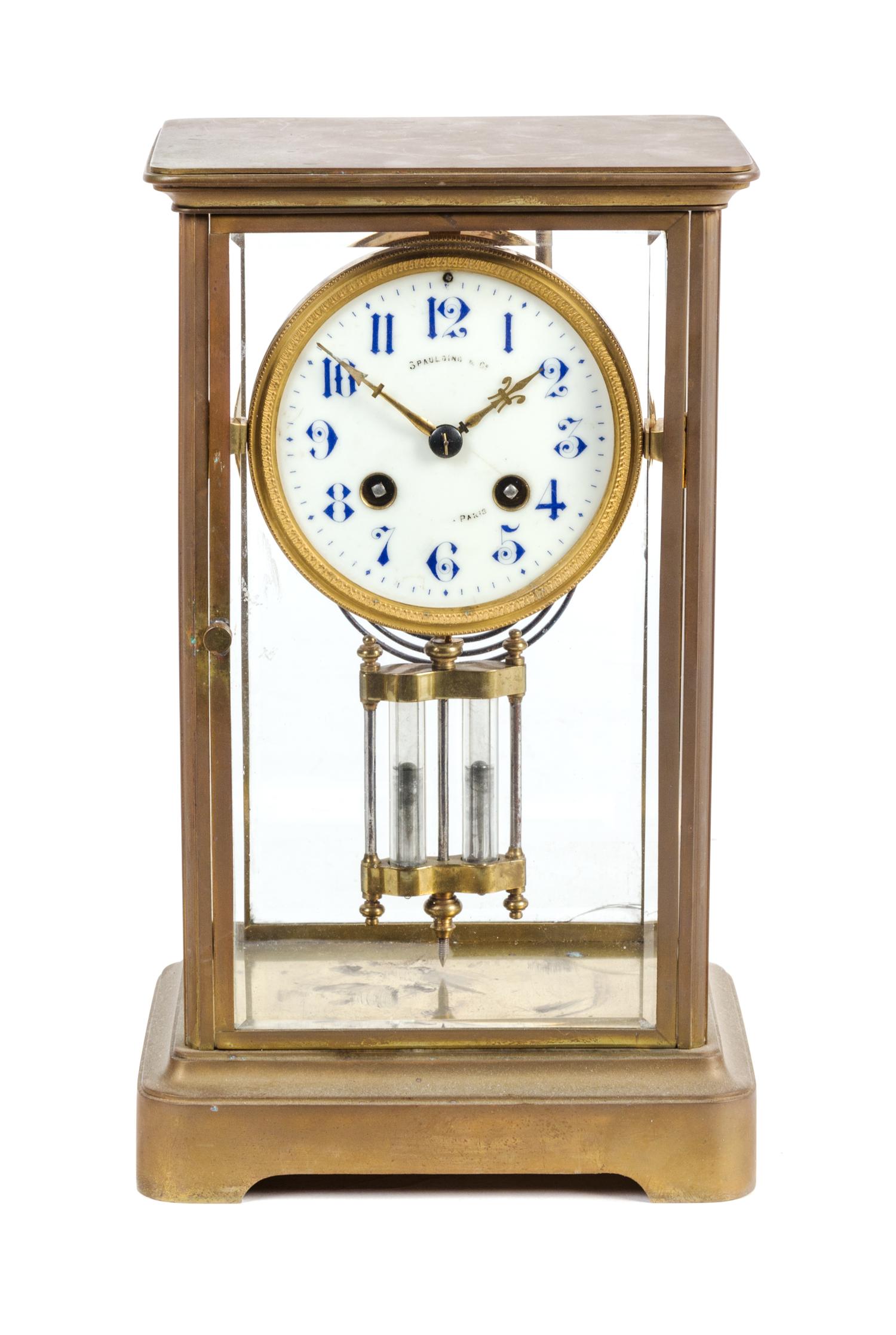 A French Brass and Glass Crystal Regulator Clock Height 11 3/4 inches. — FIRST HALF 20TH CENTURY