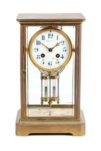 A French Brass and Glass Crystal Regulator Clock Height 11 3/4 inches. — FIRST HALF 20TH CENTURY