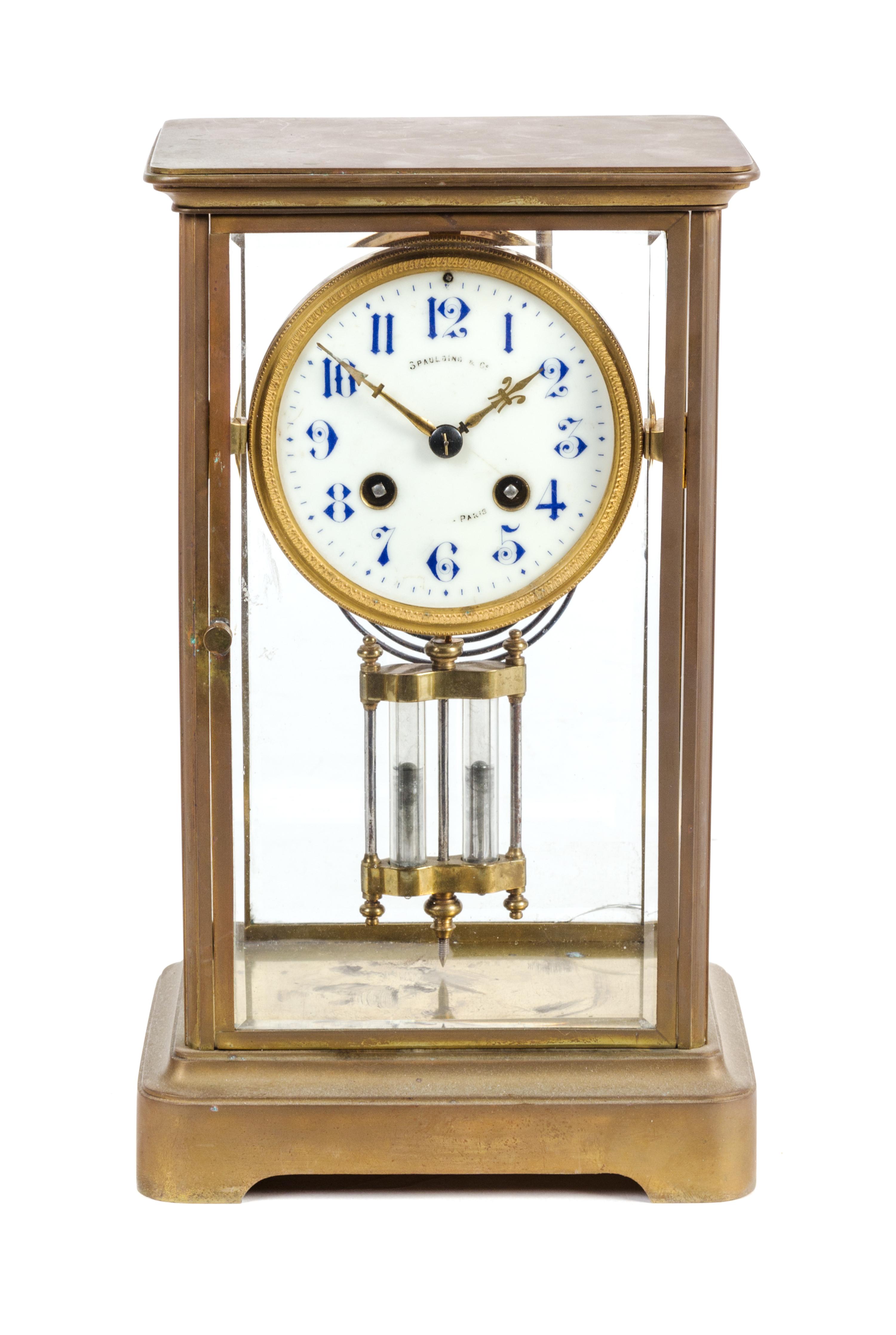A French Brass and Glass Crystal Regulator Clock Height 11 3/4 inches. — FIRST HALF 20TH CENTURY