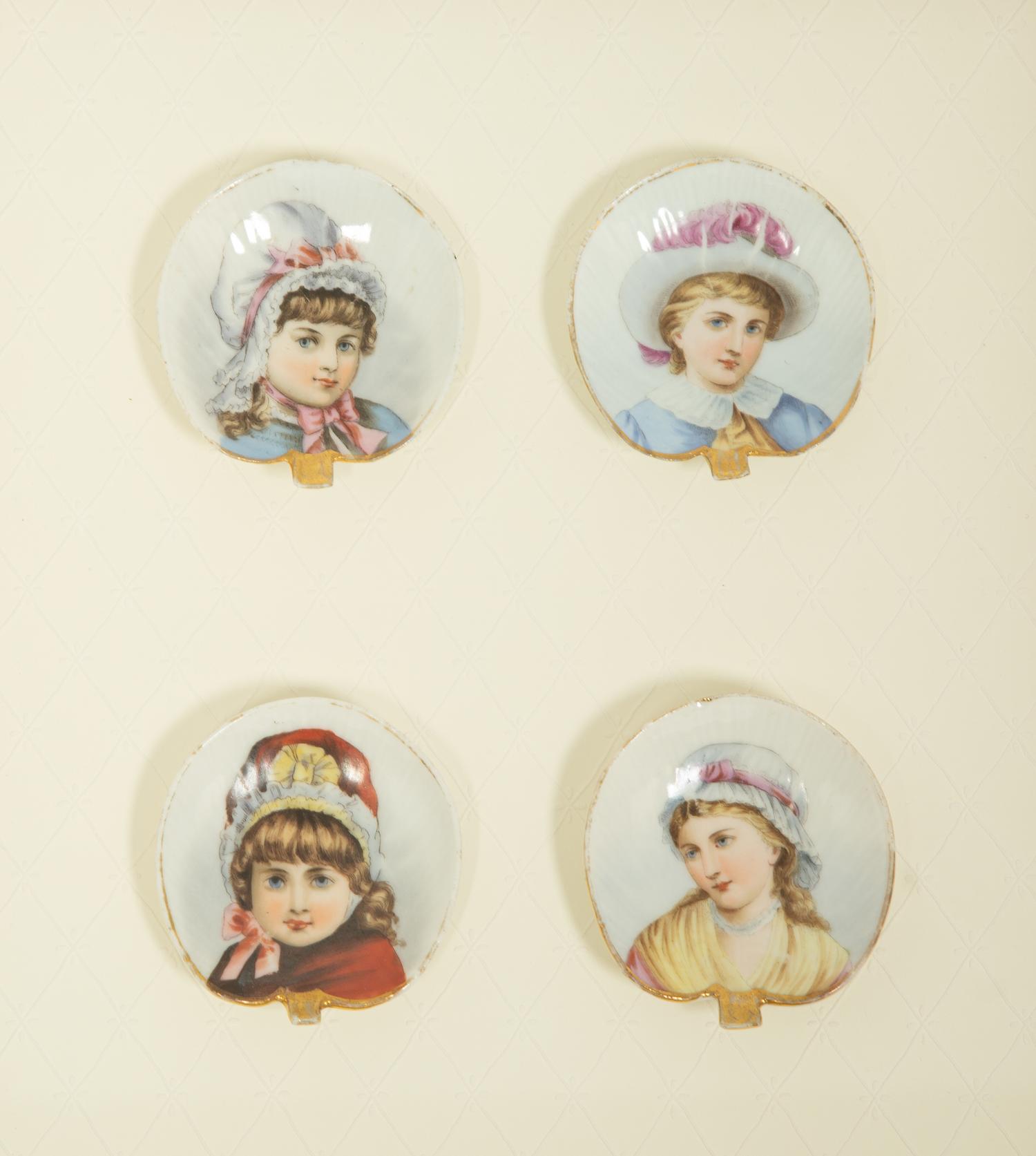 A Set of Twelve Vienna Style Porcelain Hand-Painted Portrait Medallions