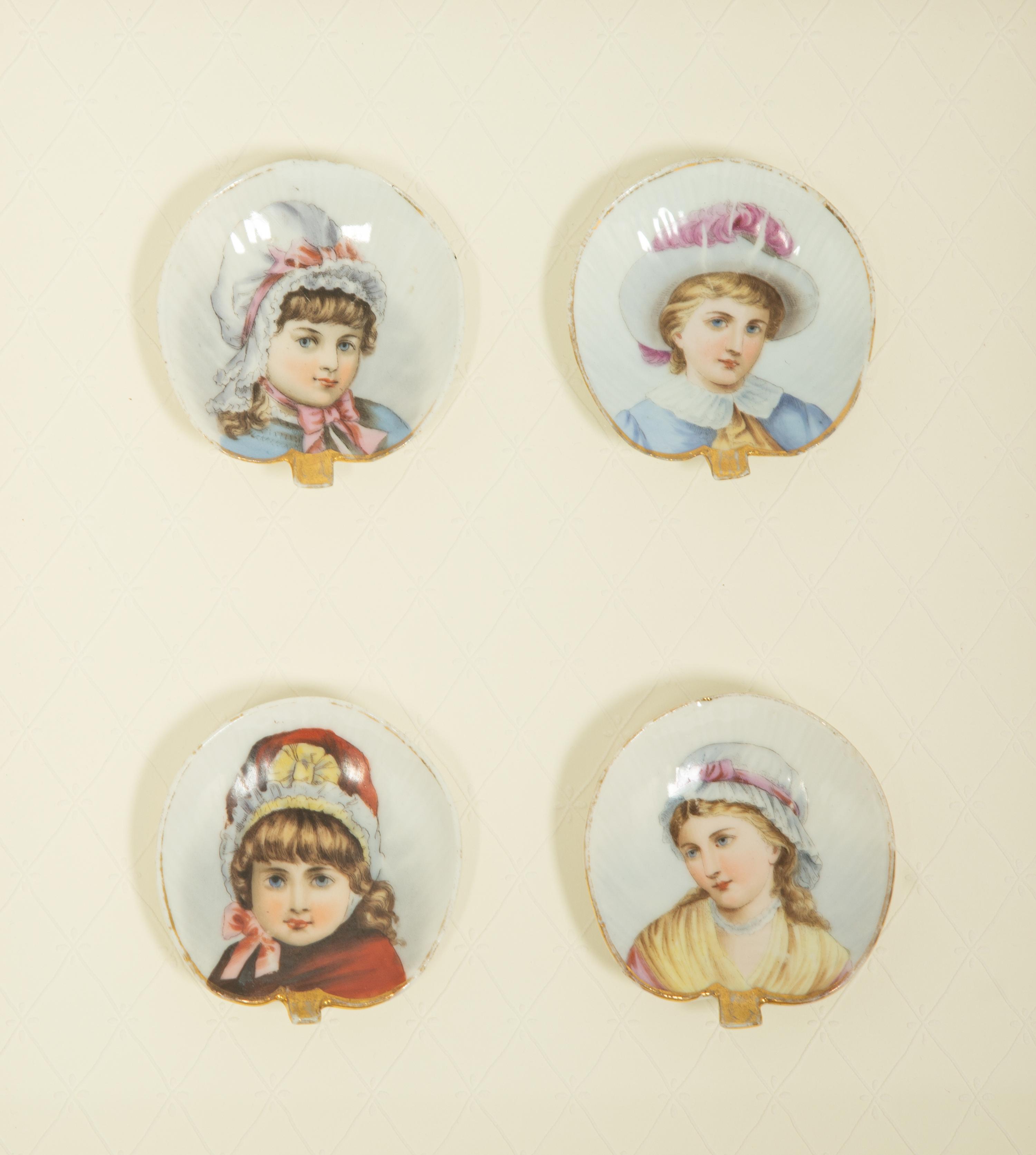 A Set of Twelve Vienna Style Porcelain Hand-Painted Portrait Medallions