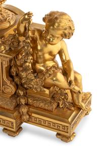 A French Gilt Bronze and Sèvres Style Porcelain Clock