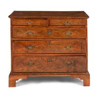 A George II Walnut Chest of Drawers