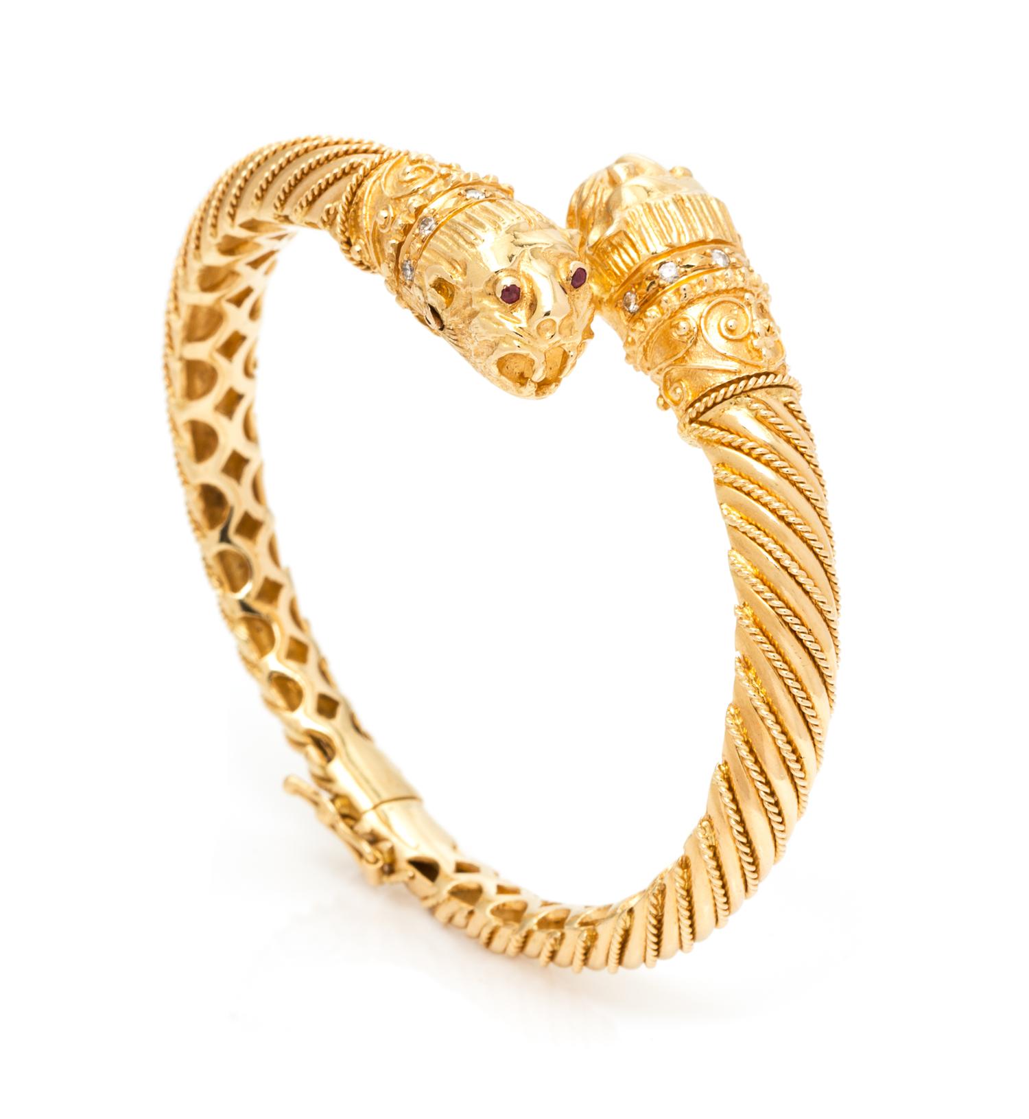 An 18 Karat Yellow Gold, Diamond and Ruby Chimera Bangle Bracelet, Fa Cad'oro, 36.30 dwts.