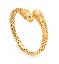 An 18 Karat Yellow Gold, Diamond and Ruby Chimera Bangle Bracelet, Fa Cad'oro, 36.30 dwts.