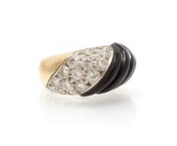 A Yellow Gold, Onyx and Diamond Ring, 5.30 dwts.