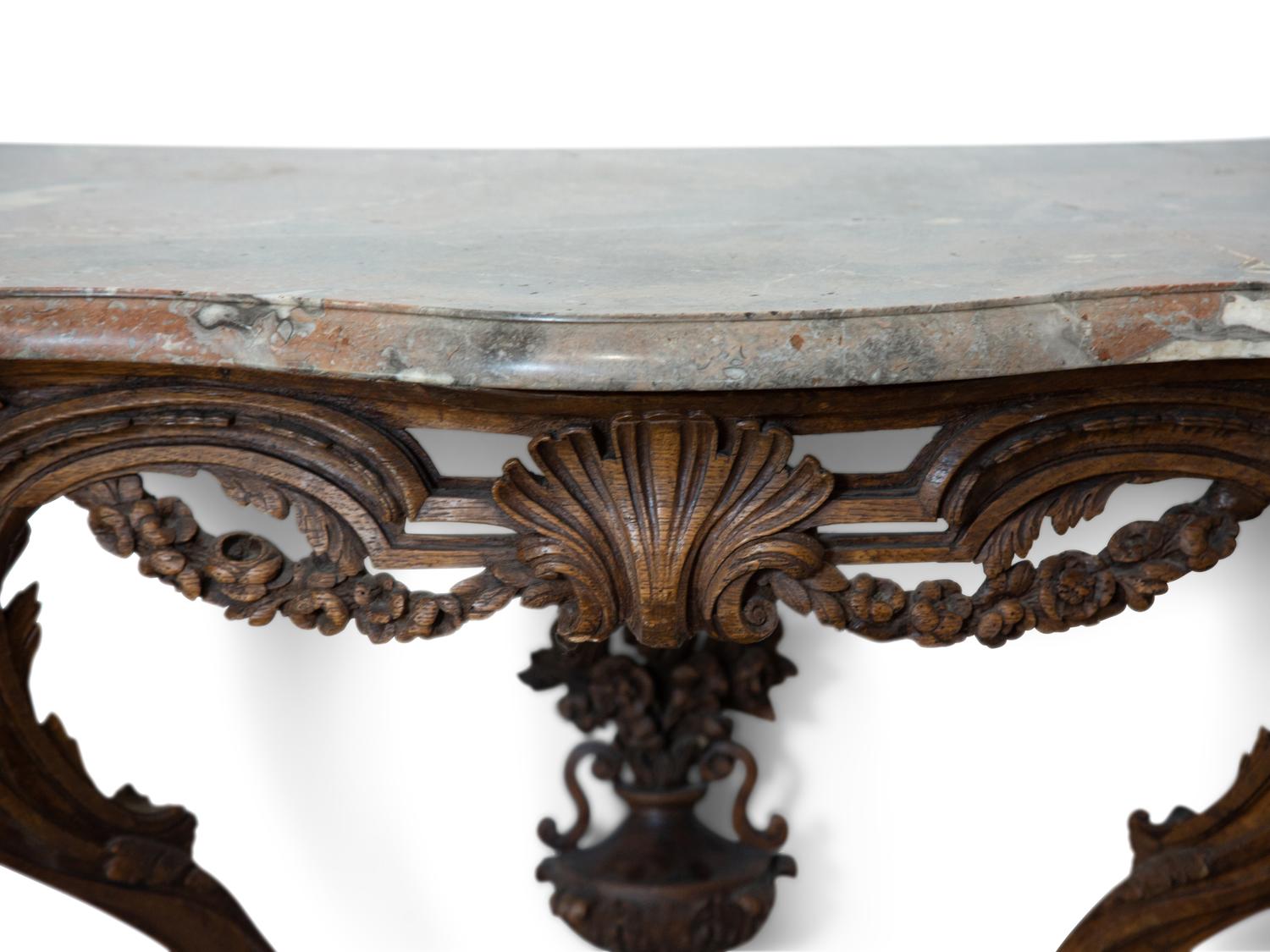 A Louis XV Carved Walnut Marble-Top Console Table