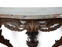 A Louis XV Carved Walnut Marble-Top Console Table