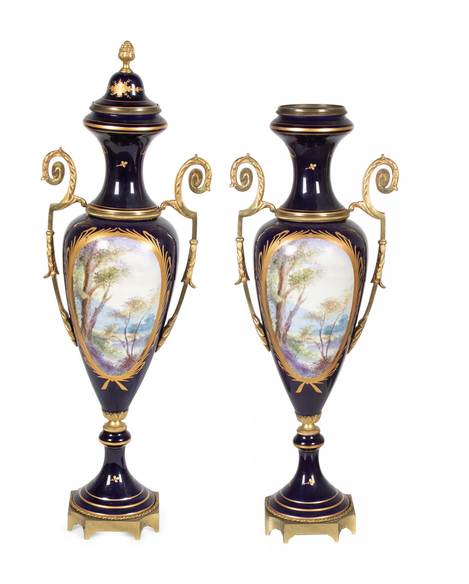 A Pair of Sèvres Style Gilt Metal Mounted Porcelain Covered Urns