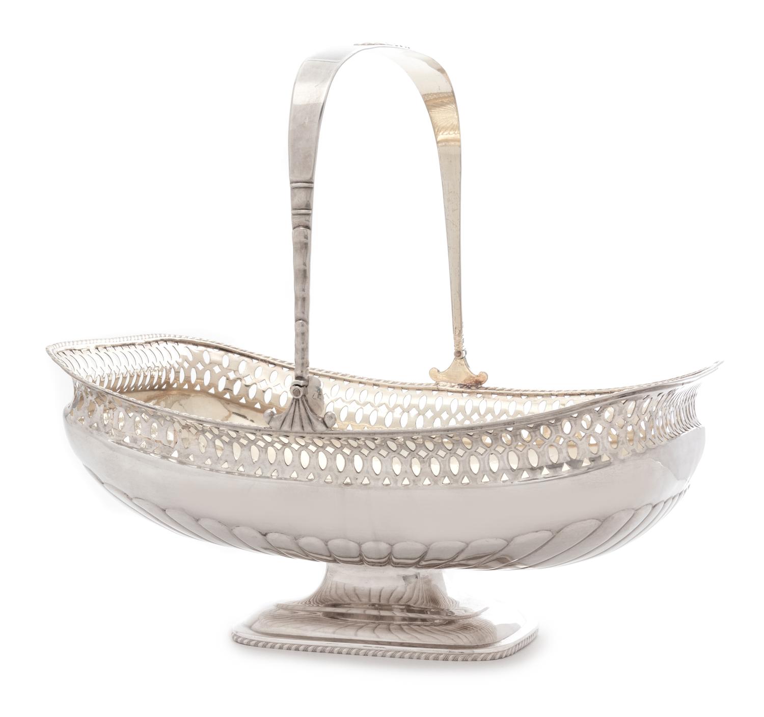 A Russian Silver Centerpiece Basket, Mark of Adolf Fredrik Soderholm, St. Petersburg, Late 19th Century, the swivel handle surmounting