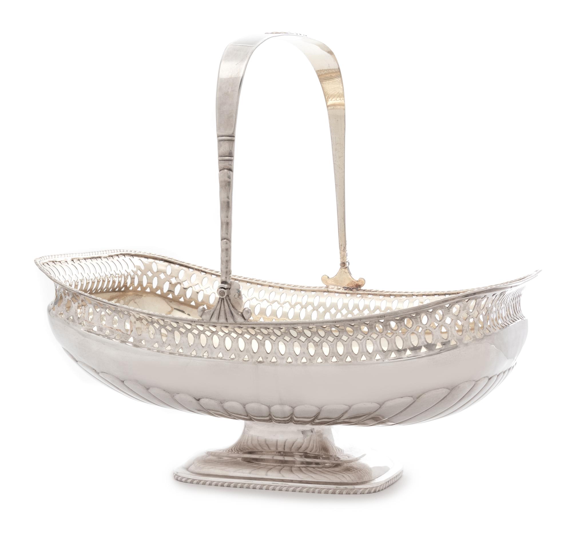 A Russian Silver Centerpiece Basket, Mark of Adolf Fredrik Soderholm, St. Petersburg, Late 19th Century, the swivel handle surmounting