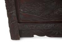 A Japanese Carved Hardwood Two-Panel Screen