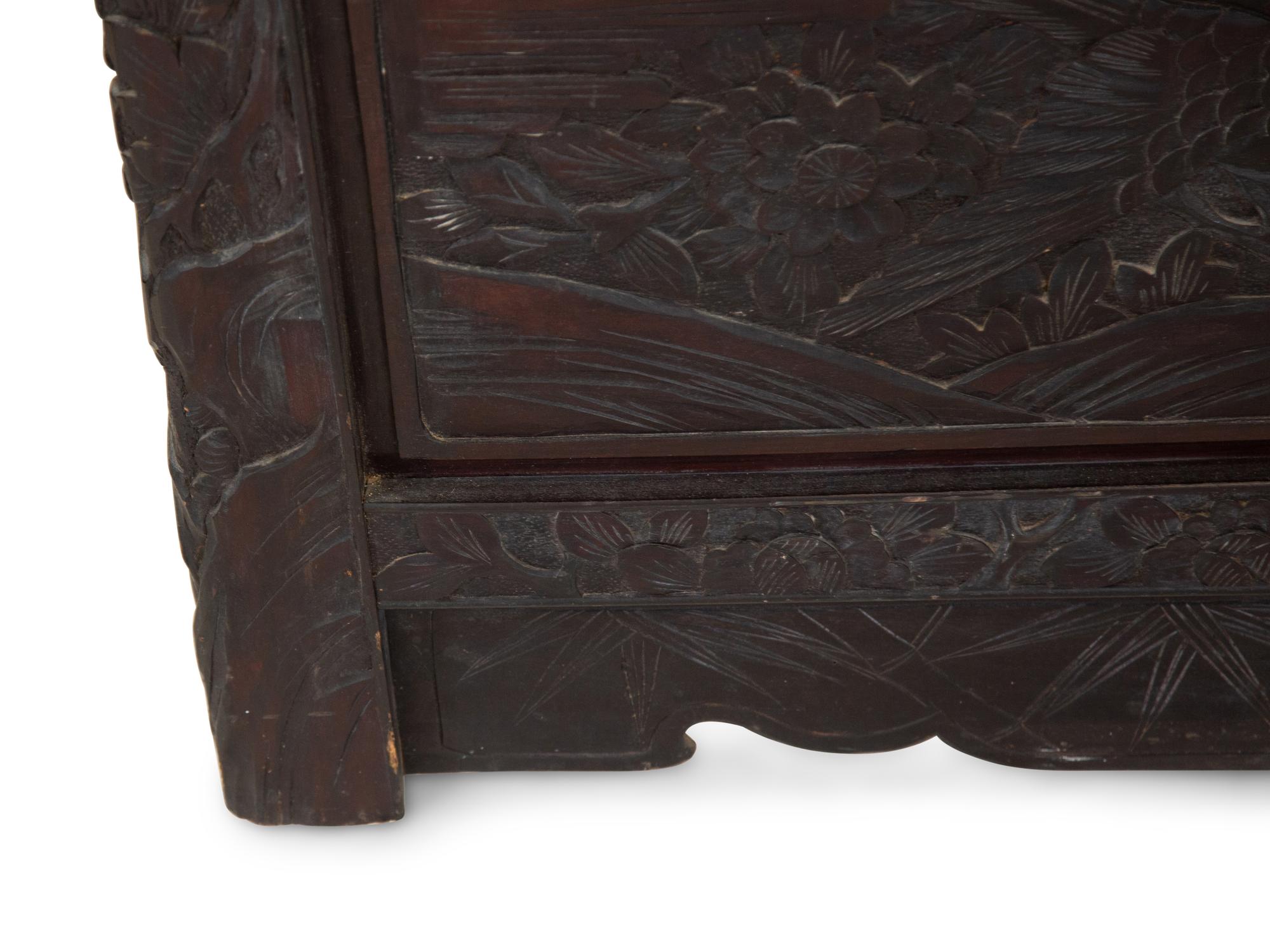A Japanese Carved Hardwood Two-Panel Screen