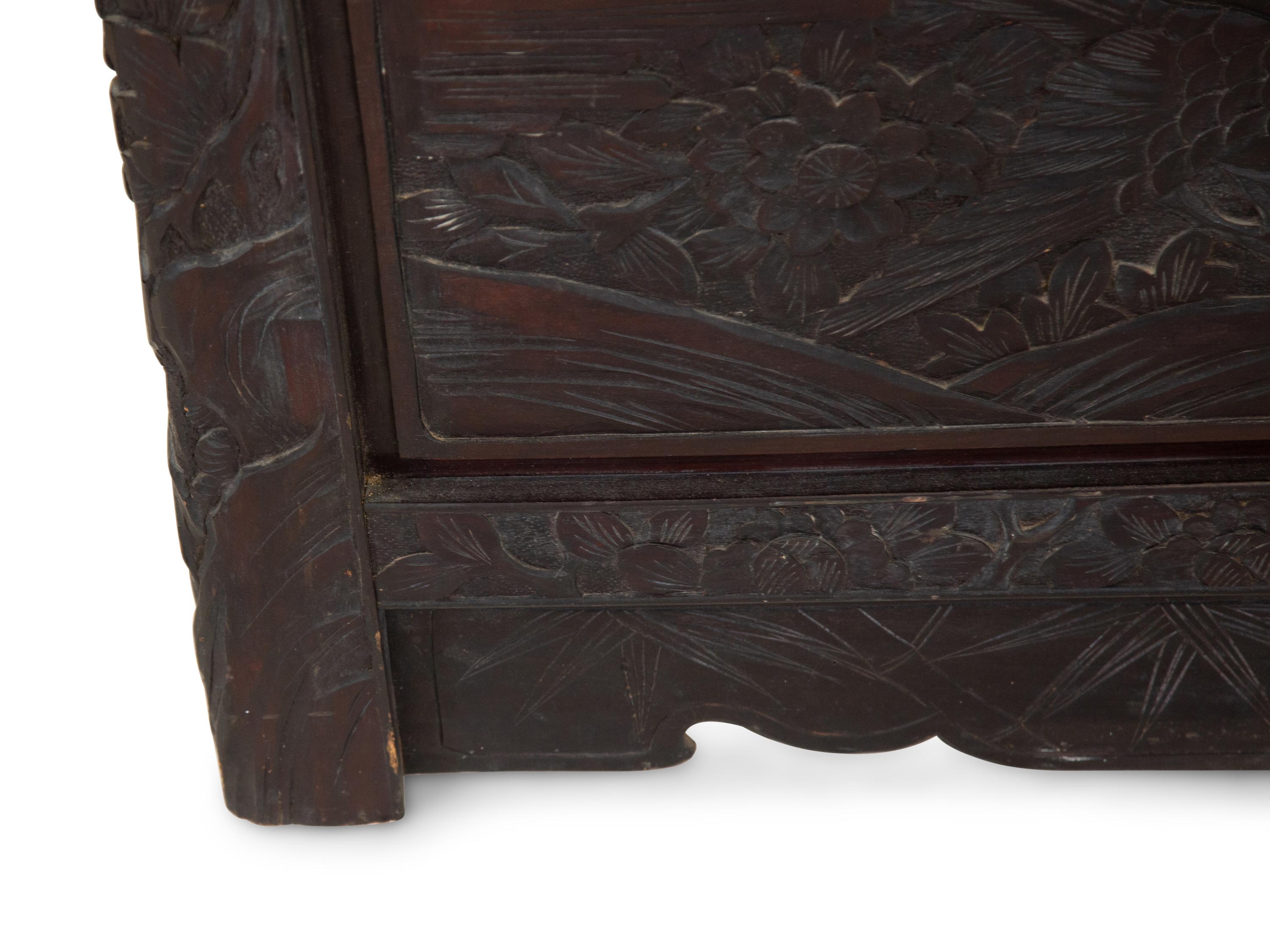 A Japanese Carved Hardwood Two-Panel Screen