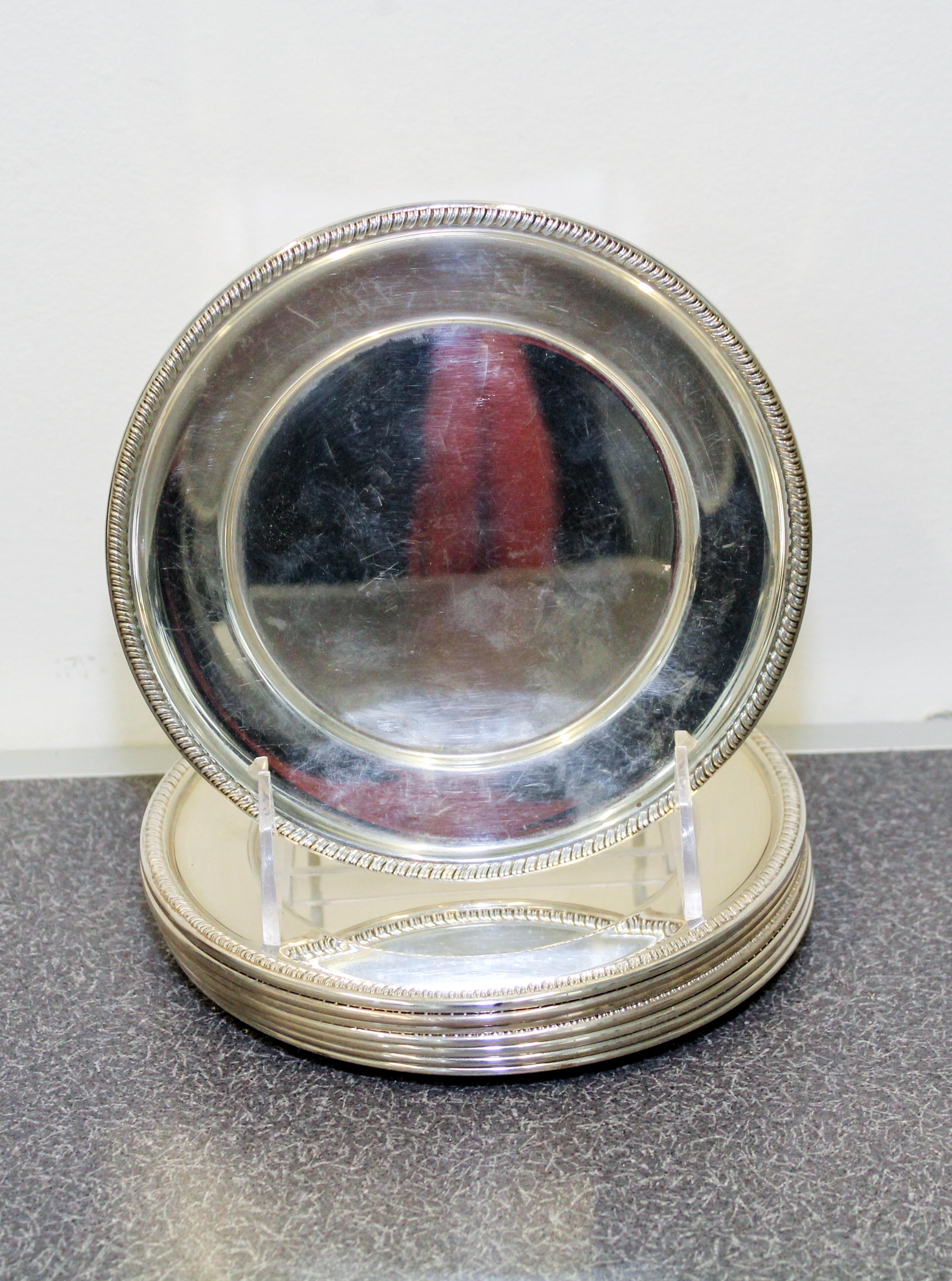 A Set of Eight American Silver Bread Plates, Hunt Silver Co., Chicago, IL, having gadrooned rims.
