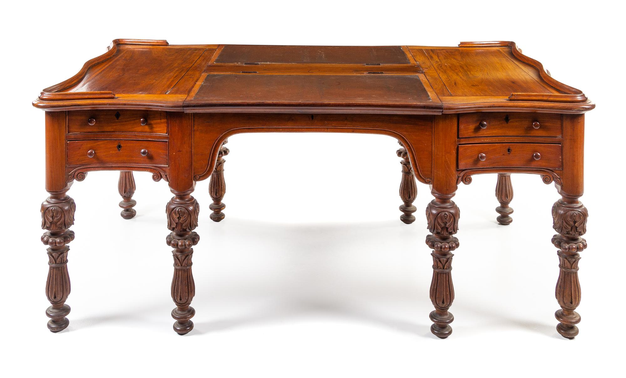 A Southeast Asian Colonial Teak Partners Desk Height 33 1/2 x width 75 1/2 x depth 44 1/2 inches.