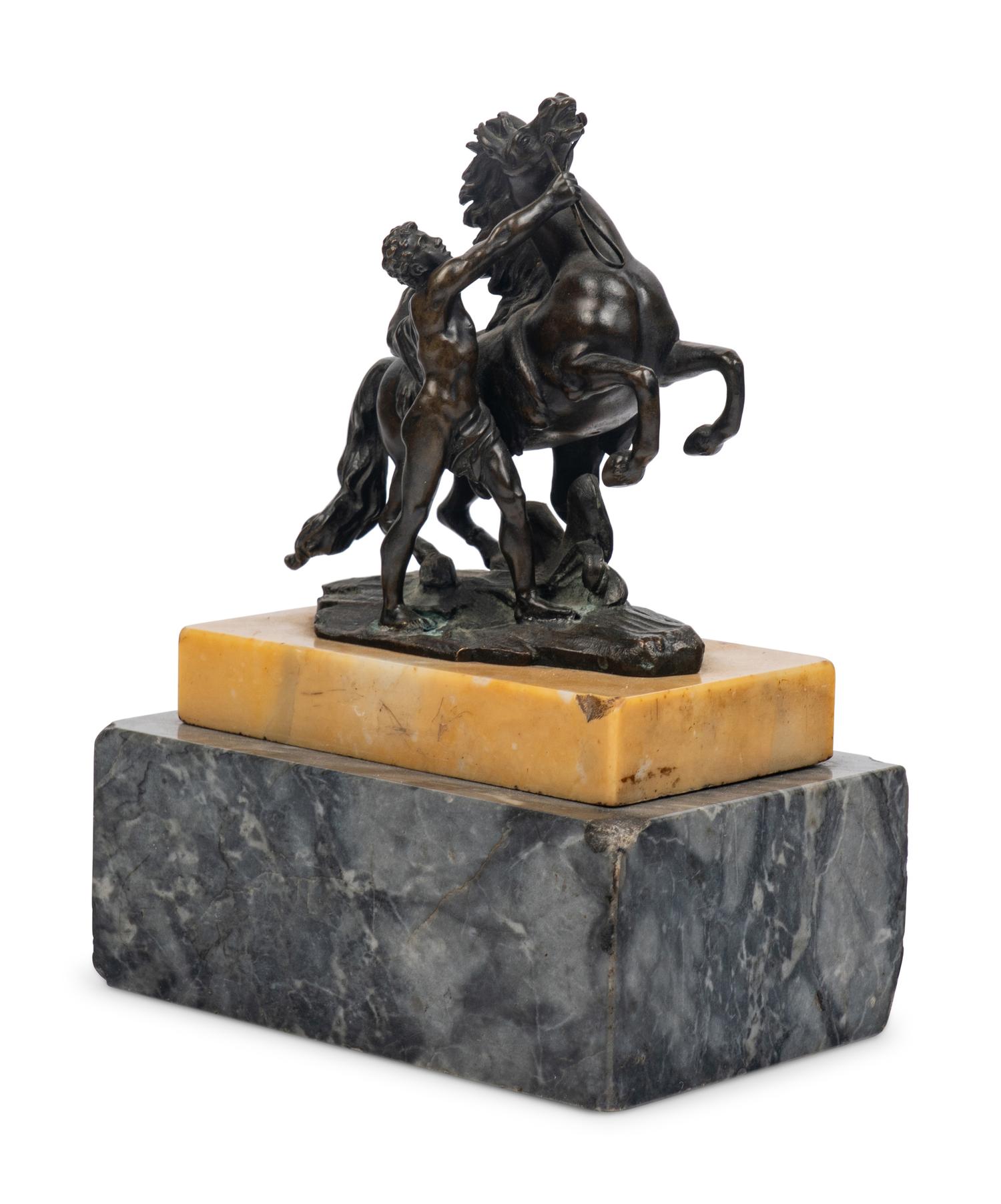 A Bronze Group of a Marly Horse with Attendant