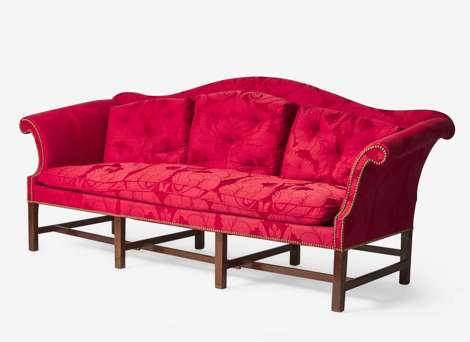 An impressive Chippendale camelback mahogany sofa with red damask upholstery, possibly 18th century and later