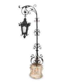 A Spanish Wrought Iron Lantern on Carved Marble Pedestal