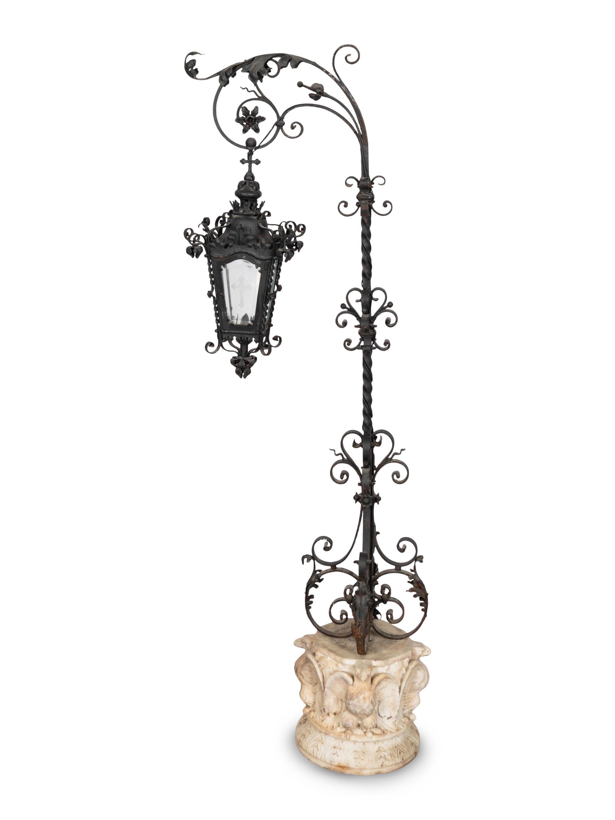 A Spanish Wrought Iron Lantern on Carved Marble Pedestal