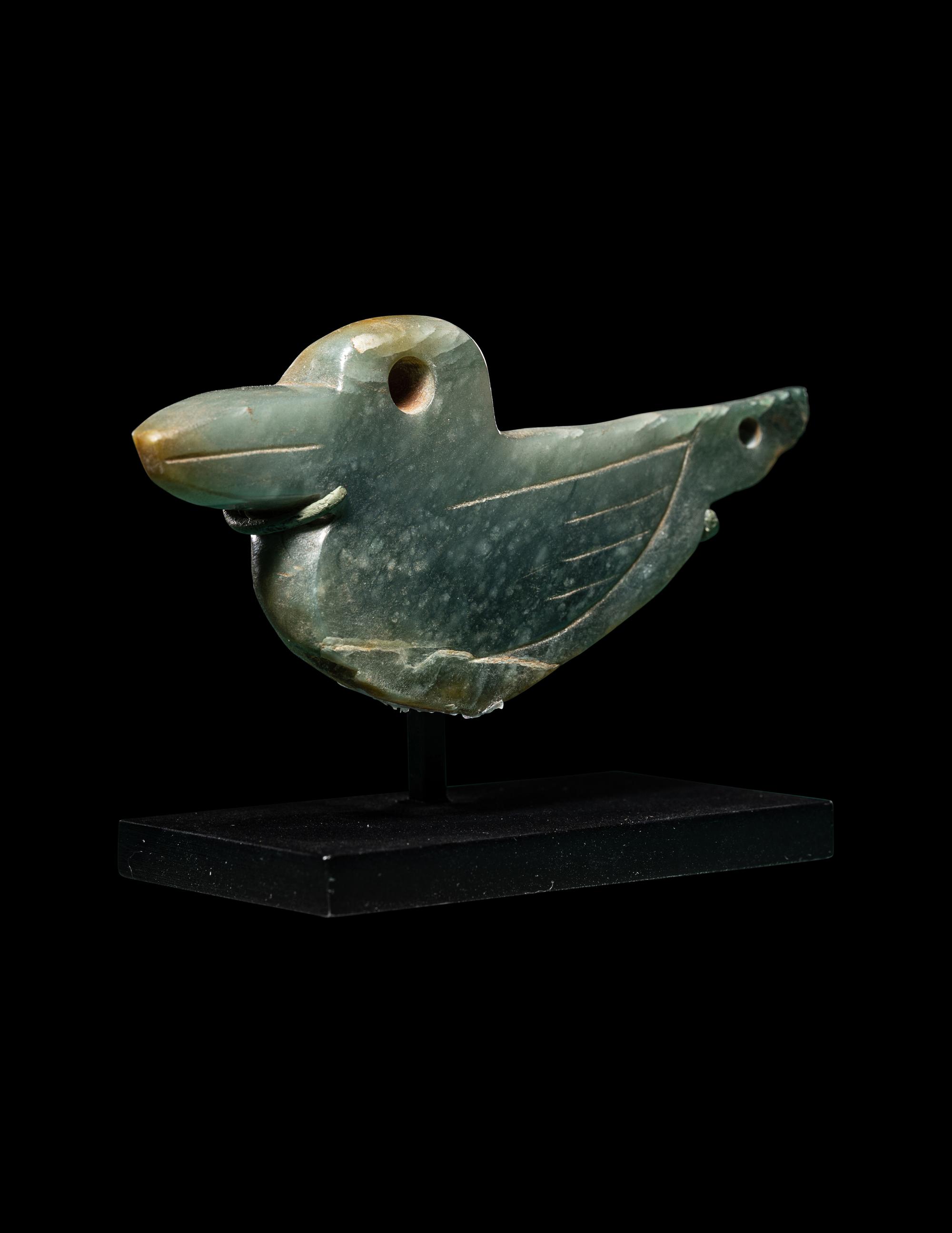 An Olmec Jade Duck Pendant