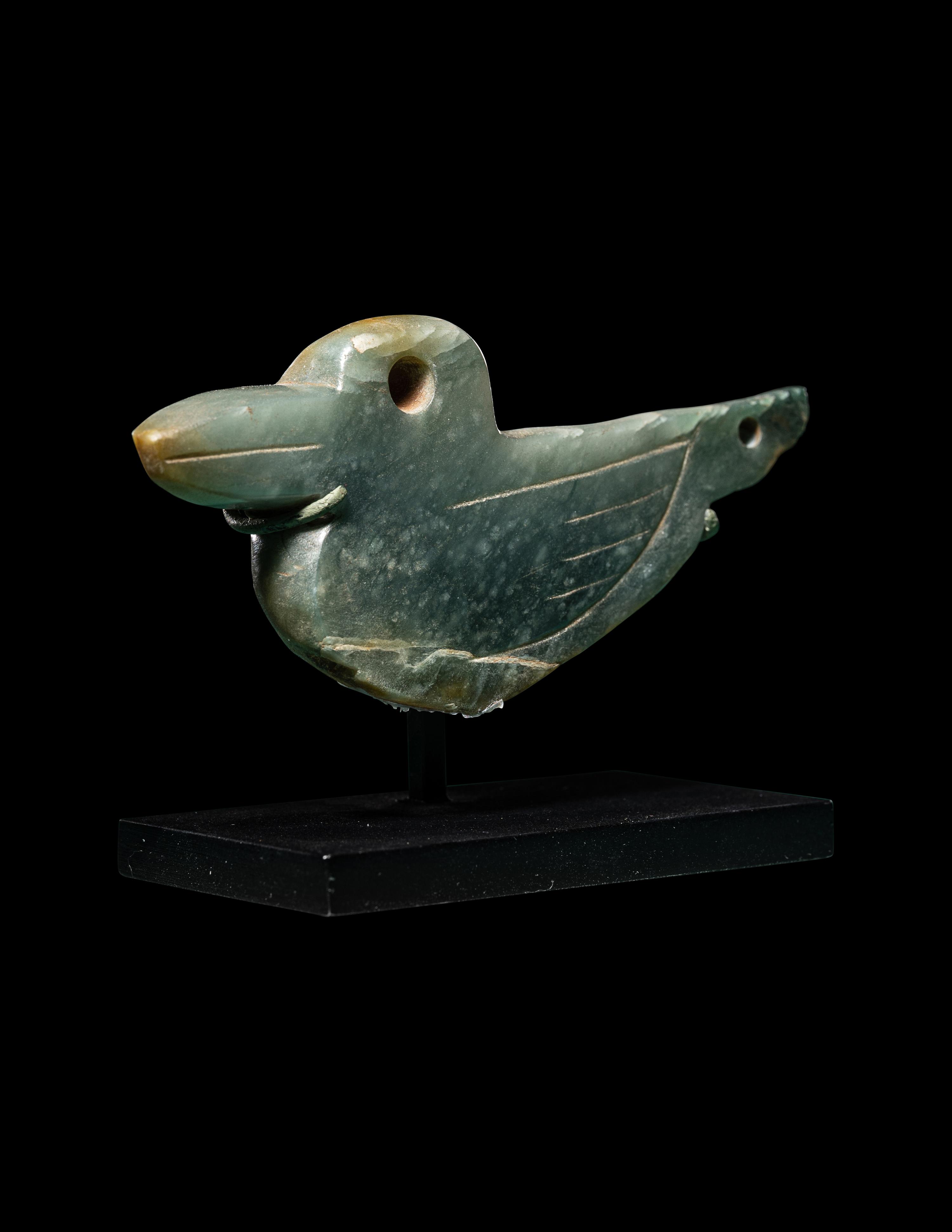 An Olmec Jade Duck Pendant