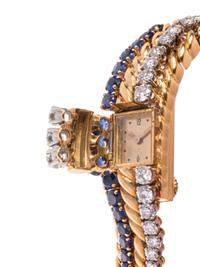 BOUCHERON, DIAMOND AND SAPPHIRE SURPRISE WRISTWATCH