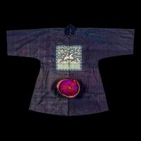 A Chinese Navy Blue Ground Official's Surcoat, Bufu, and A Velvet-Brimmed Winter Hat, Jiguan, 19th Century 清中晚期 藍地一品文官補服及冬吉冠一頂