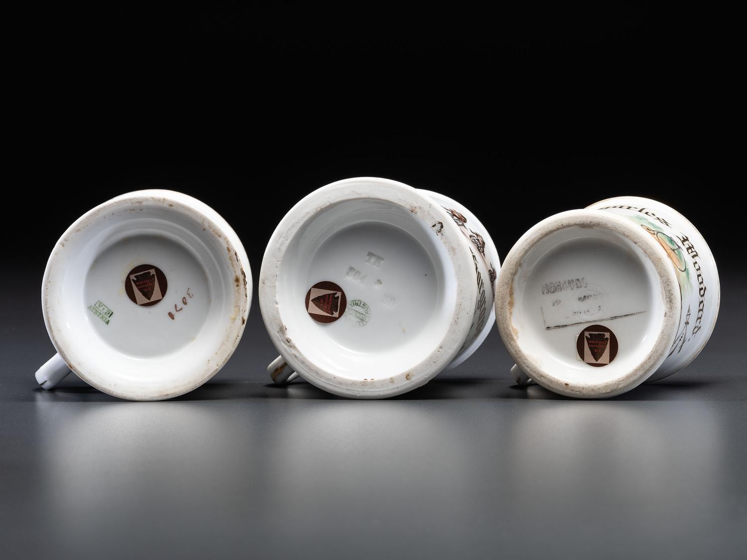 Three Cyclist's Porcelain Shaving Mugs