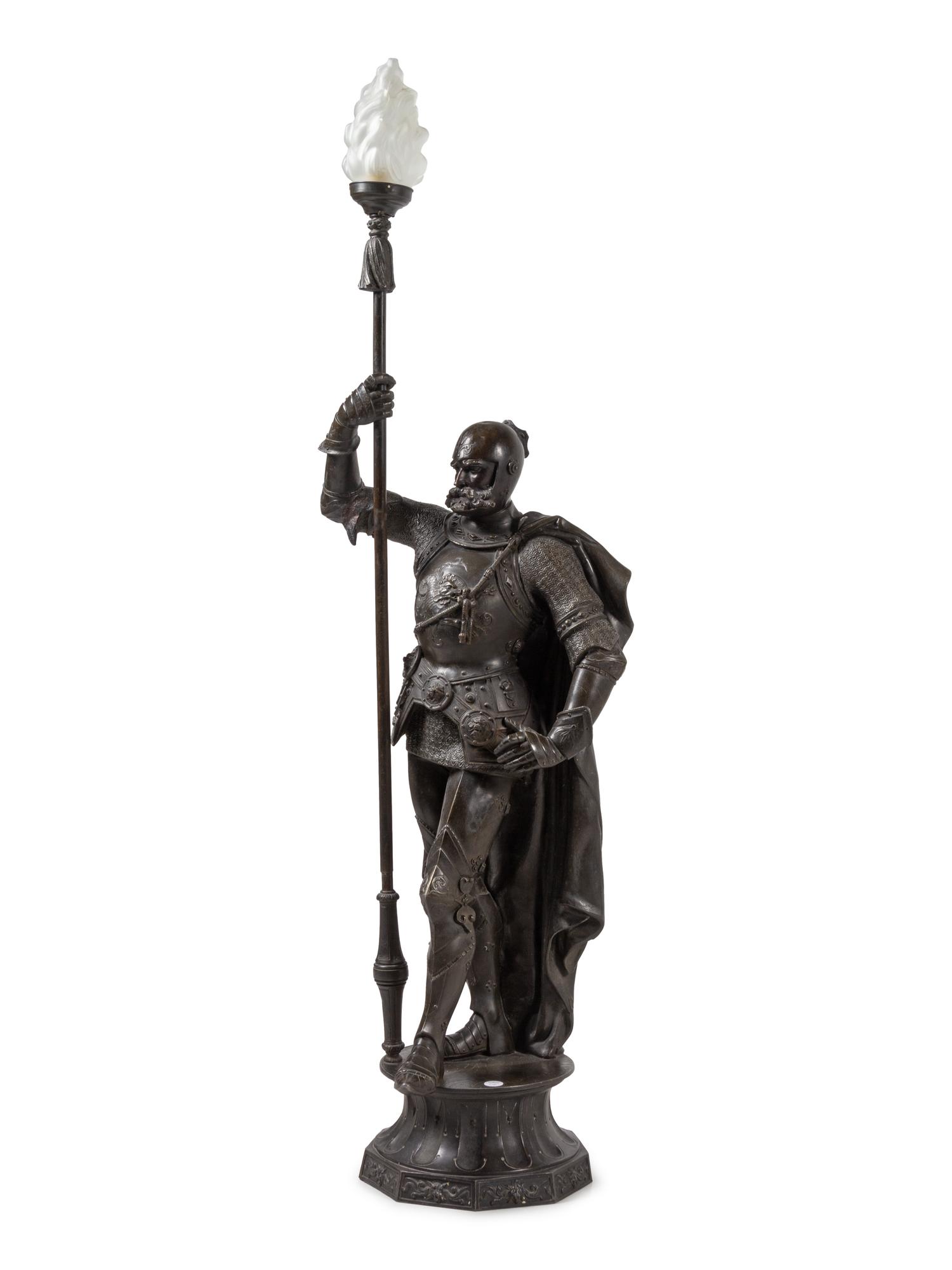 A Cast Metal Figural Newel Post Lamp