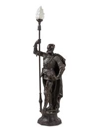 A Cast Metal Figural Newel Post Lamp