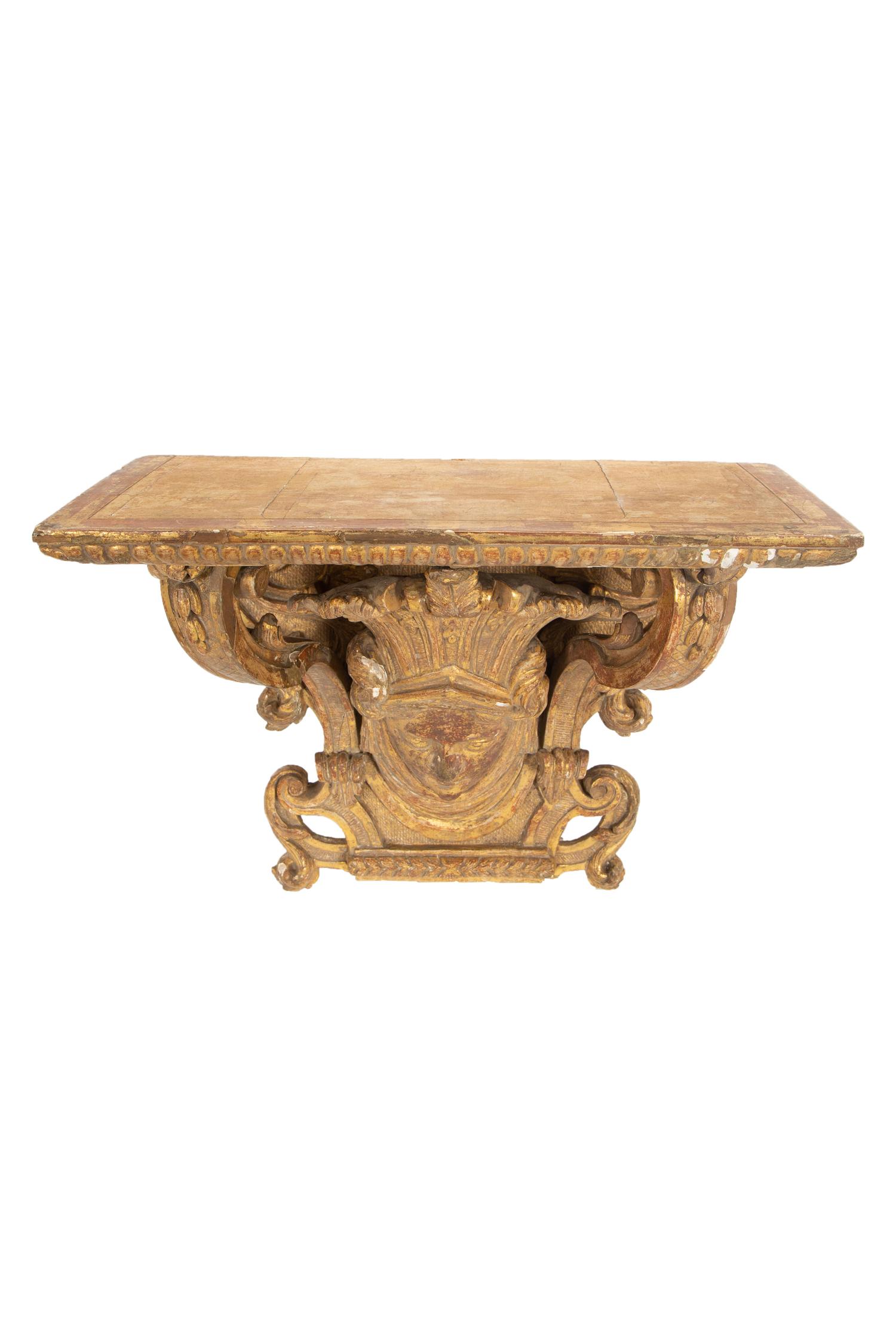 A Pair of Tin-Glazed Earthenware Wall Brackets, and Two Giltwood Wall Brackets