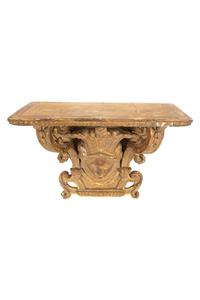 A Pair of Tin-Glazed Earthenware Wall Brackets, and Two Giltwood Wall Brackets