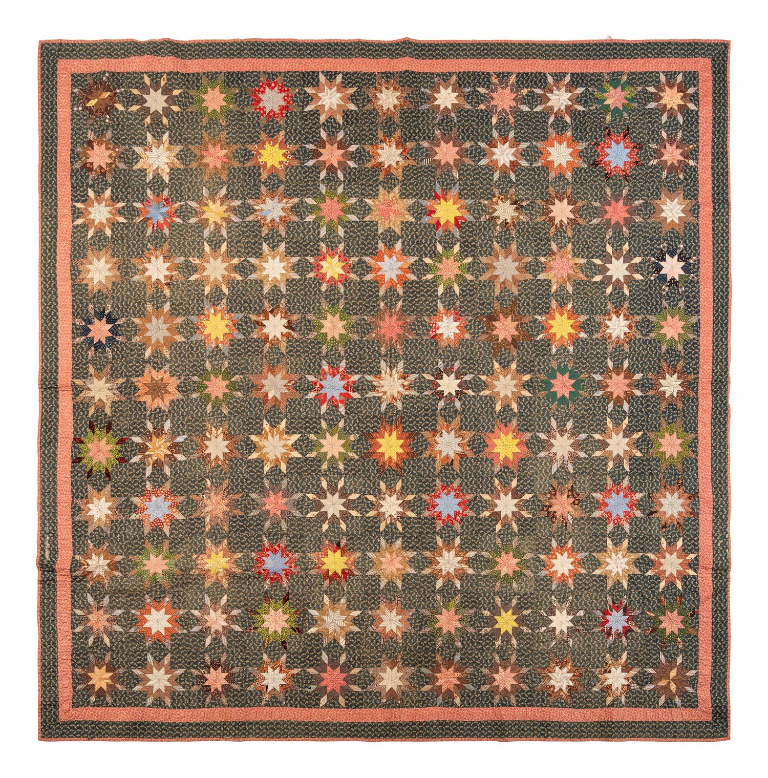 A Pieced Printed Cotton 'Eight Pointed Star' Variation Pattern Quilt