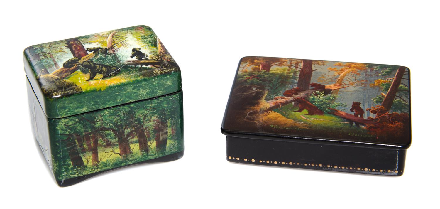 Two Russian Lacquered Boxes, 20th Century, each of rectangular form with hinged lids, both decorated with bears in a forest.