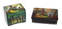 Two Russian Lacquered Boxes, 20th Century, each of rectangular form with hinged lids, both decorated with bears in a forest.