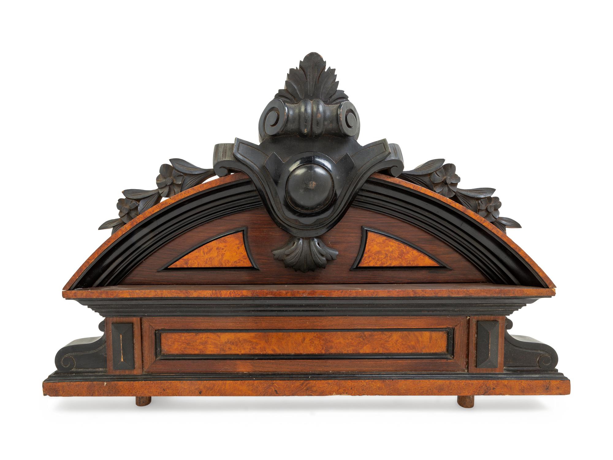 A Victorian Parcel Ebonized Crest Board