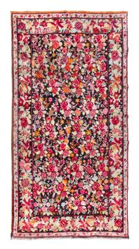 A Karabaugh Wool Rug 10 feet 8 1/4 inches x 5 feet 9 1/2 inches.