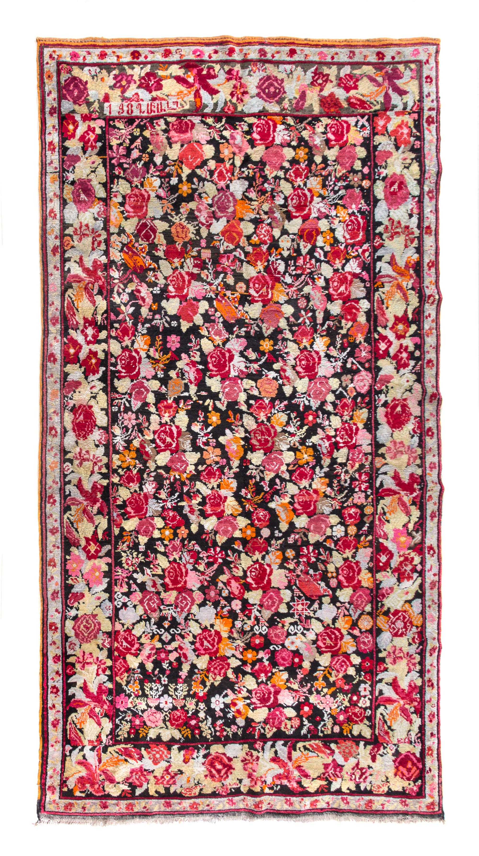 A Karabaugh Wool Rug 10 feet 8 1/4 inches x 5 feet 9 1/2 inches.