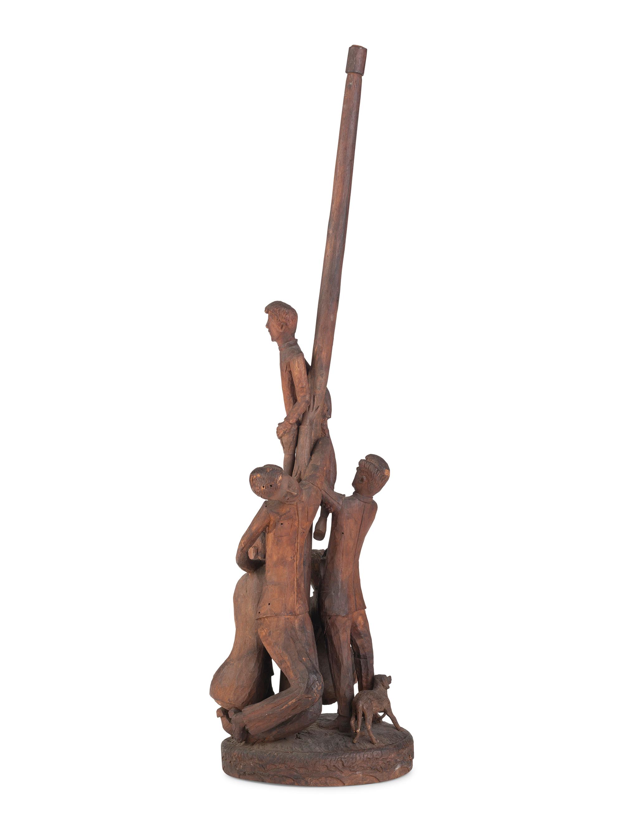 A Folk Art Carved Wood Figural Group