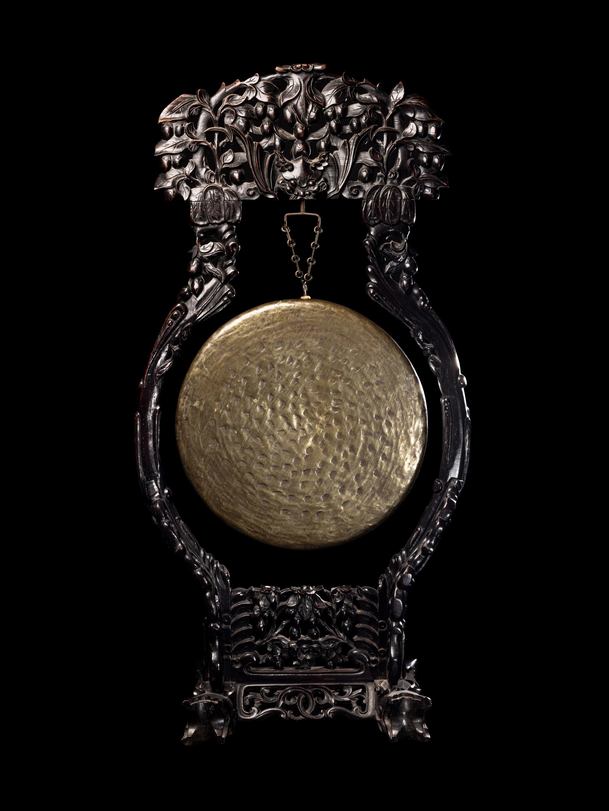 A Large Chinese Bronze Gong with a Carved Rosewood Stand