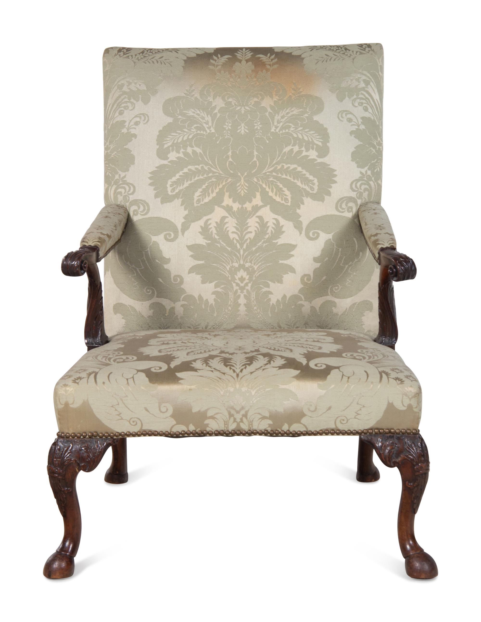 A George II Carved Mahogany Library Chair