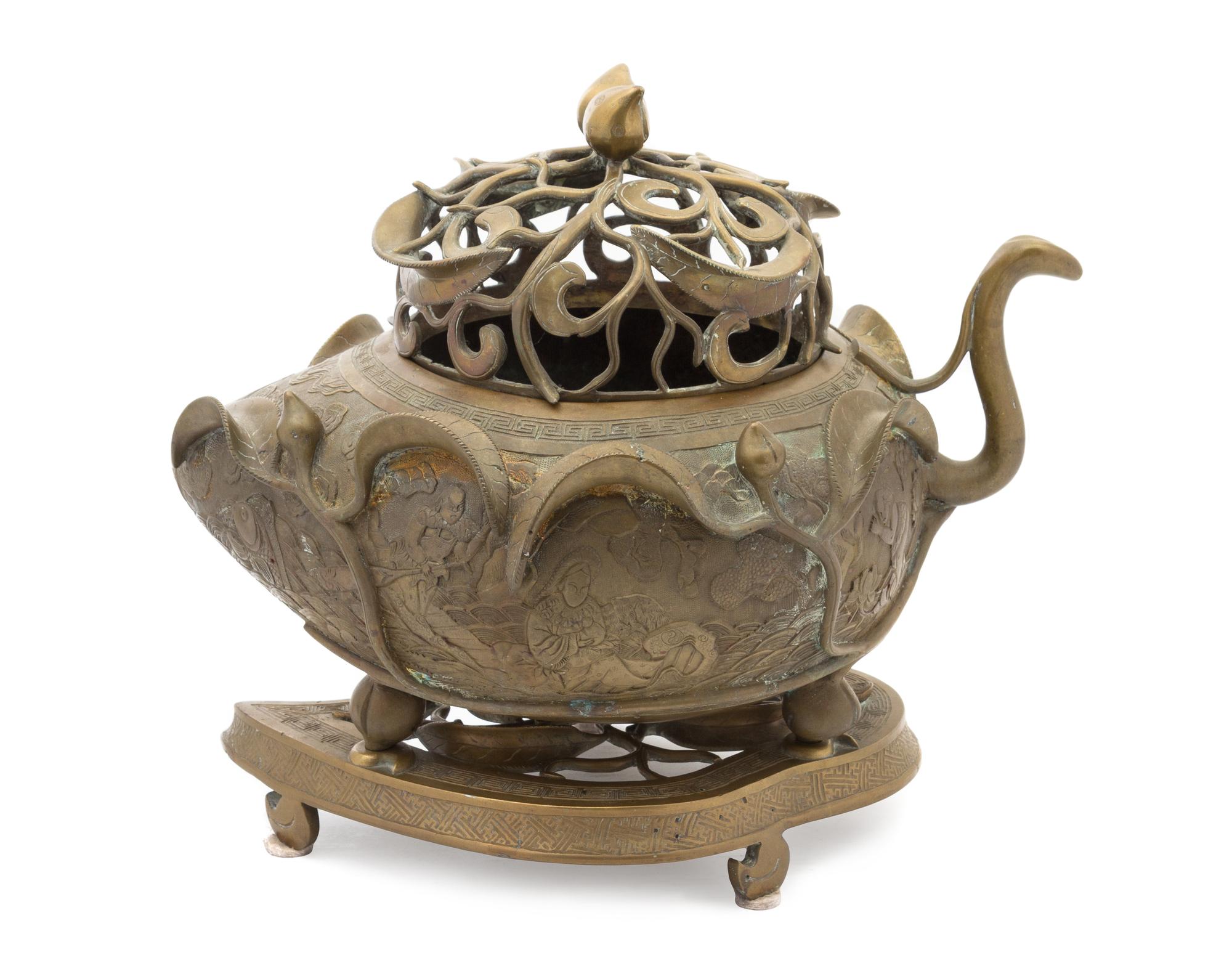 A Large Chinese Bronze Peach-Form Tripod Censer 19TH CENTURY OR EARLIER Height overall 14 inches. — 19TH CENTURY OR EARLIER