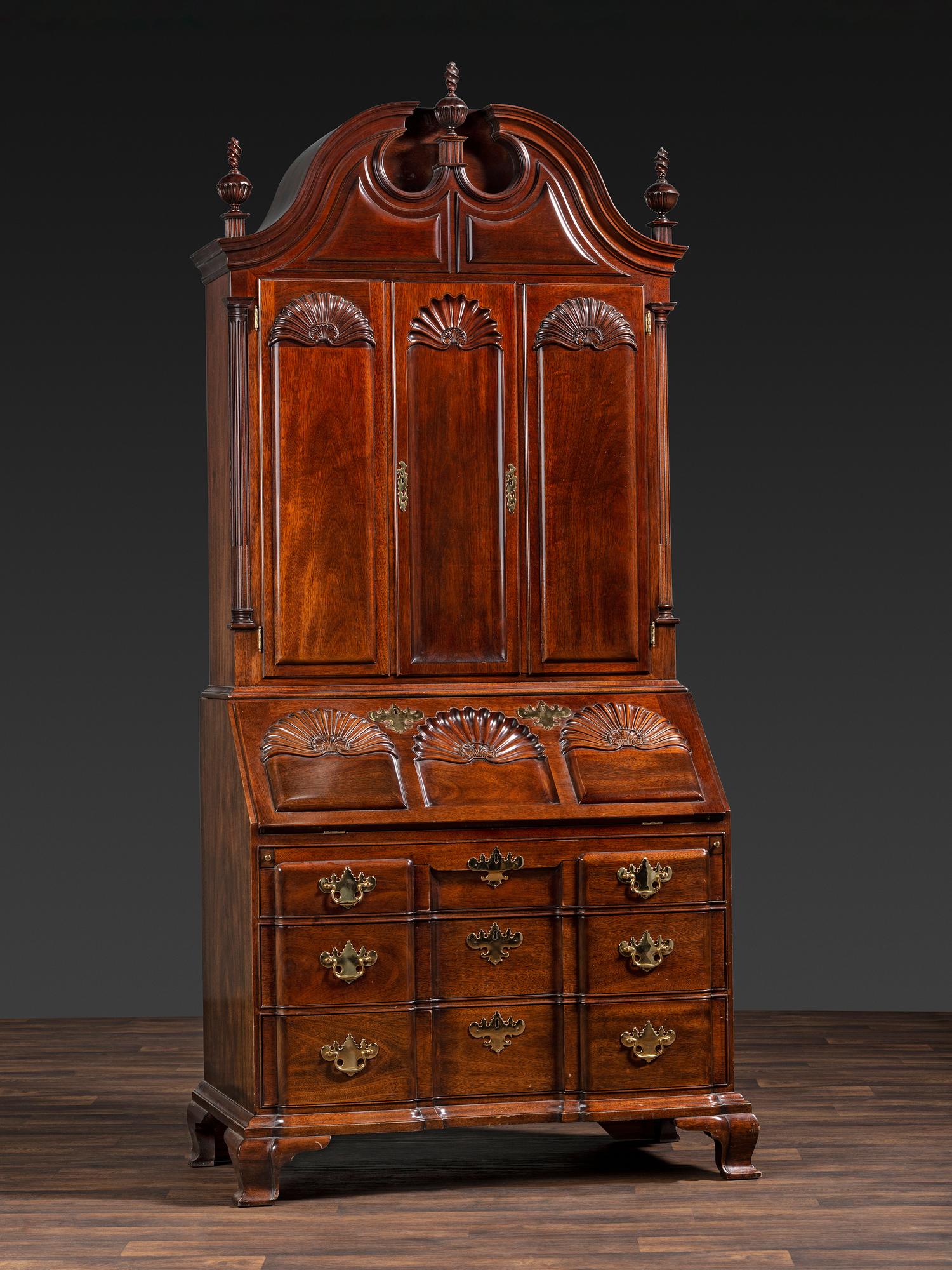 A Kindel Chippendale Revival Shell-and-Block Front Desk-and-Bookcase