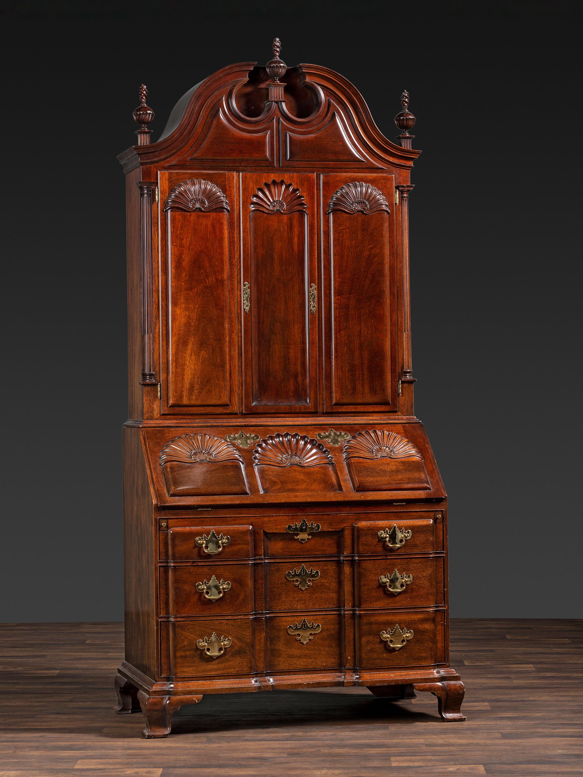 A Kindel Chippendale Revival Shell-and-Block Front Desk-and-Bookcase