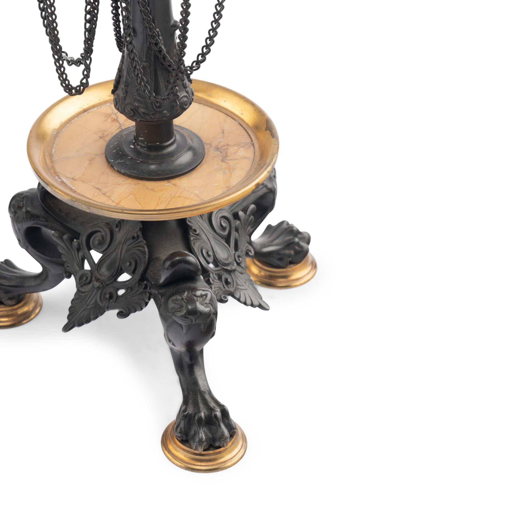 A Pair of French Neoclassical Patinated and Parcel Gilt Bronze and Marble Candelabra