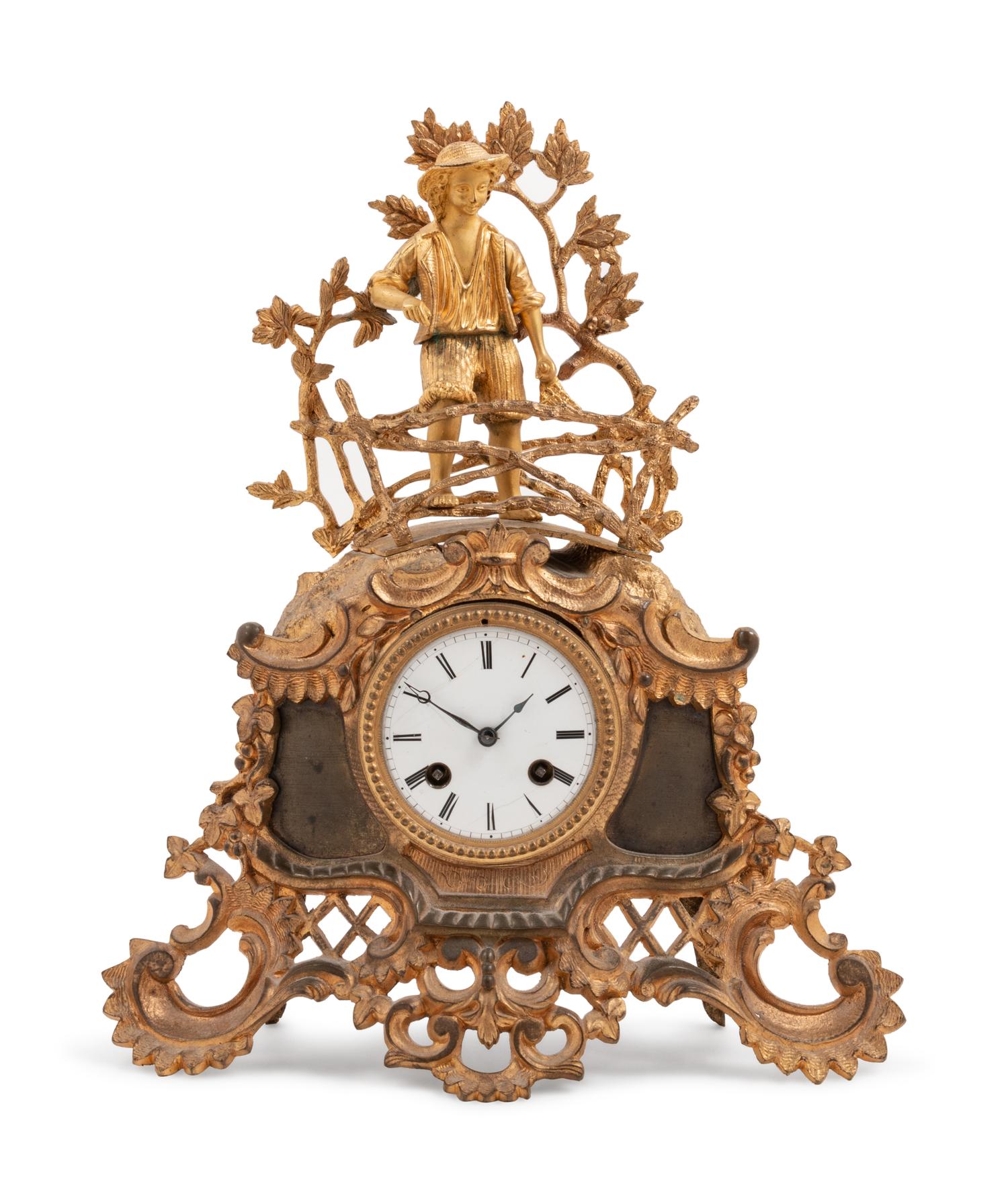 A Continental Gilt Metal Mantel Clock