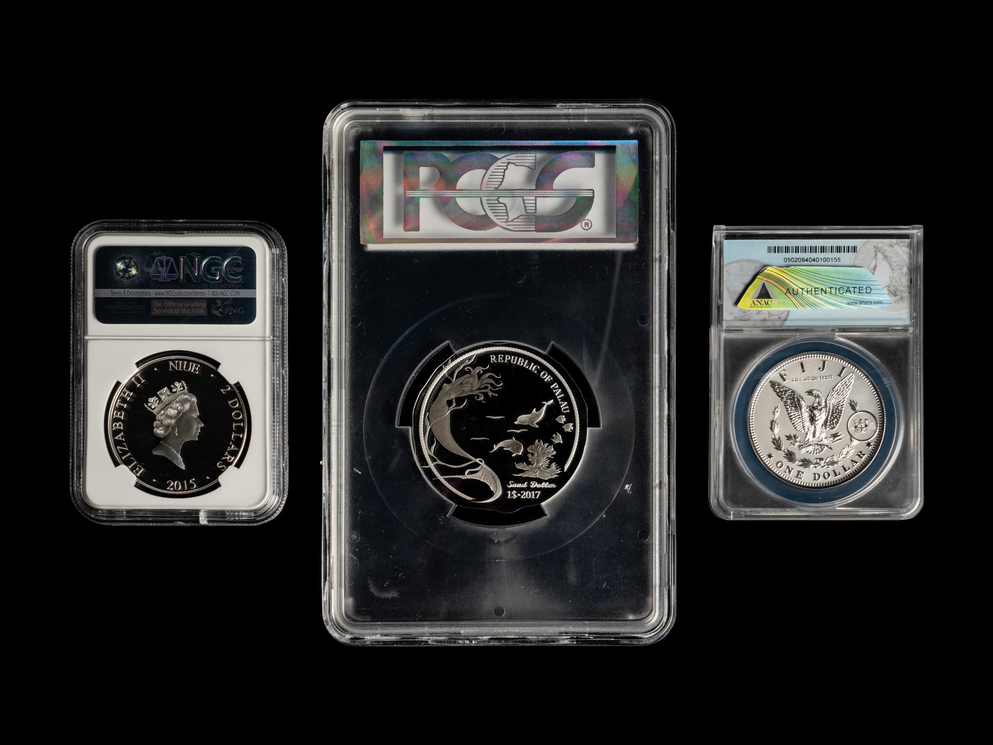 [INTERNATIONAL] A Collection of Thirty-One Government-Issued and Third-Party Graded Commemorative Coins